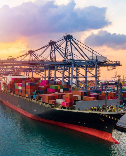 Aerial view container ship carrying container in import export business logistic and transportation of international by container ship in the open sea.